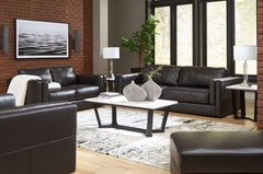 Keen on crisp, contemporary design? Adore the pleasure of leather? Look no further. This living room set satisfies on every level. Richly textured and decadently supple, the plush cushions are wrapped with combination leather and faux leather upholstery i