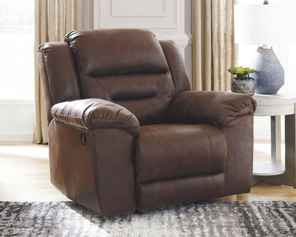  this rocker recliner delivers both with ease. Its high-performance padded faux leather is remarkably durable and easy to clean