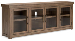 Elevate your entertainment experience with this TV stand. A functional focal point for your living room, itâ€™s defined by a richly versatile finish. Instantly upgrade game days and movie nightsâ€”the large-scale silhouette easily hosts flat screens. And 