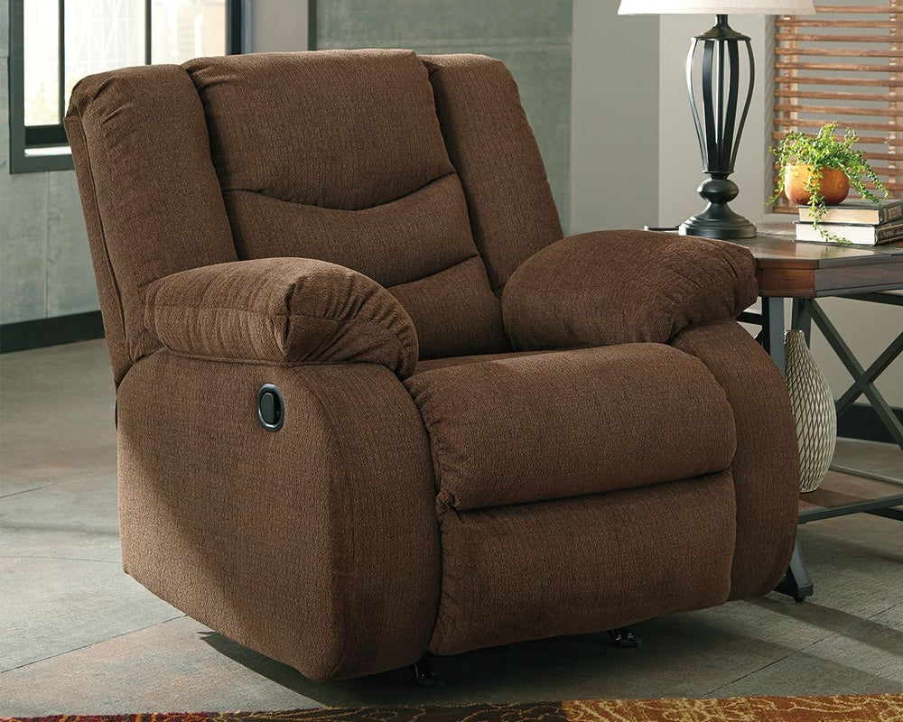 This rocker recliner puts the win in winning. Its waterfall back design and doubly plump pillow top arms team up with soft chenille fabric to go for the goal. Ample seating room makes the comfort possibilities endless. Sit back and relax. You wonâ€™t go w