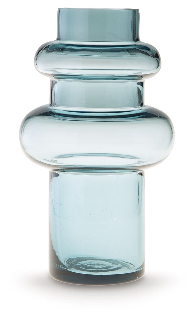This contemporary vase is anything but ordinary. Displayed on its own or with faux greenery, the statement-making accentâ€”crafted from blown glass in a blue hueâ€”rounds out your modern decor beautifully.<br/><br/><b>Product Features</b><ul><li>Made of b