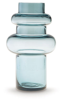 This contemporary vase is anything but ordinary. Displayed on its own or with faux greenery, the statement-making accentâ€”crafted from blown glass in a blue hueâ€”rounds out your modern decor beautifully.<br/><br/><b>Product Features</b><ul><li>Made of b