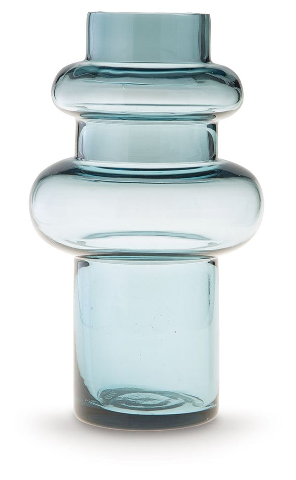 This contemporary vase is anything but ordinary. Displayed on its own or with faux greenery, the statement-making accentâ€”crafted from blown glass in a blue hueâ€”rounds out your modern decor beautifully.<br/><br/><b>Product Features</b><ul><li>Made of b