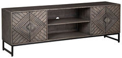 For admirers of understated vintage glamour, this accent cabinet beautifully complements your desired aesthetic. The classic charm of a distressed gray finish meets chic metropolitan styling, with art deco-inspired door fronts and an industrial black meta