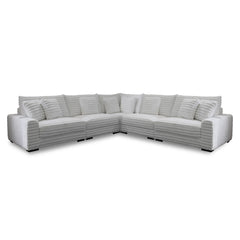 The Embrace 5-Piece Modular Sectional in white is an epitome of comfort and style, designed to cater to your lounging needs. It includes a right arm facing chair, a left arm facing chair, two armless chairs, a wedge, and eight accent pillows, all crafted 