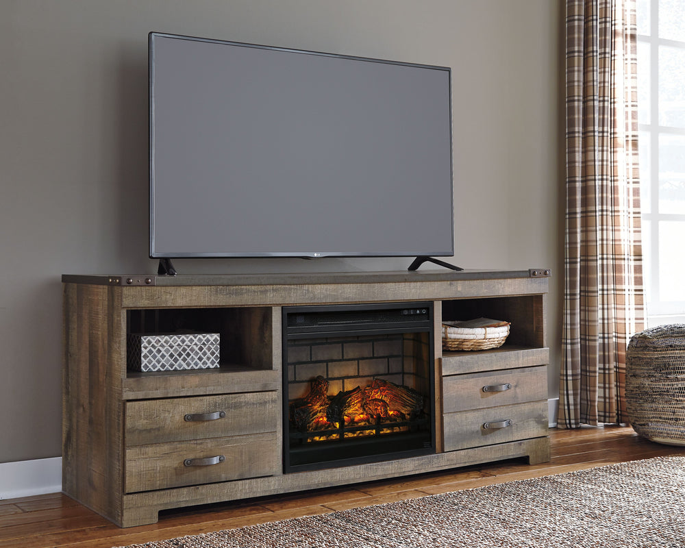 Entertain a rugged yet refined sense of style with this TV stand with fireplace insert. Rustic finish and plank-style details pay homage to reclaimed barn wood, while metal banding with nailhead accents infuses a touch of industrial cool. Ultra clean line