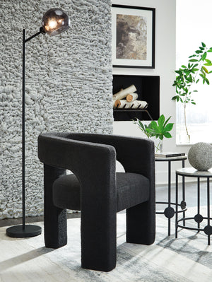  this accent chair exudes runway-inspired style. Peek-a-boo styling and decadent boucle upholstery combine both fashion and comfort seamlessly. Who says cutouts are just for your wardrobe?<br><br><b>Ad