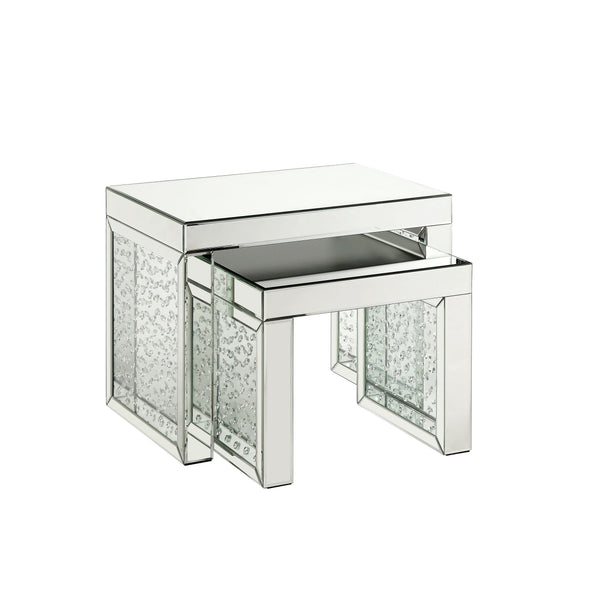 Go full glam with this Nysa Accent Table. The brilliant mirrored table top and glistening faux crystals inlay will reflect light and make any room appear larger. It provides a spacious table top ample enough for displaying various decor items while the sl