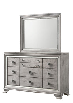 This elegant bedroom suite combines timeless design with contemporary appeal. The soft gray finish offers a modern twist on classic styling, with integrated LED lighting on the tufted headboard adding a luxurious focal point. The collection includes a bed