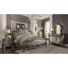 Sleep like royalty with this Versailles II bed set. The bedroom set was inspired by old European design. The bed features carved scrollwork accent with nailhead trim Decor and tufted upholstery on both headboard and footboard. The accent pieces crafted in