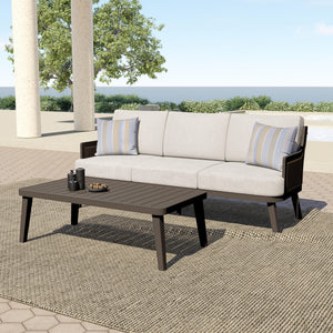 The Genova 2-Piece Patio Set, featuring a spacious patio sofa and a stylish coffee table, effortlessly combines durability, comfort, and modern sophistication for any outdoor space. Built with durable aluminum frames and a baked-on powder coat finish, thi