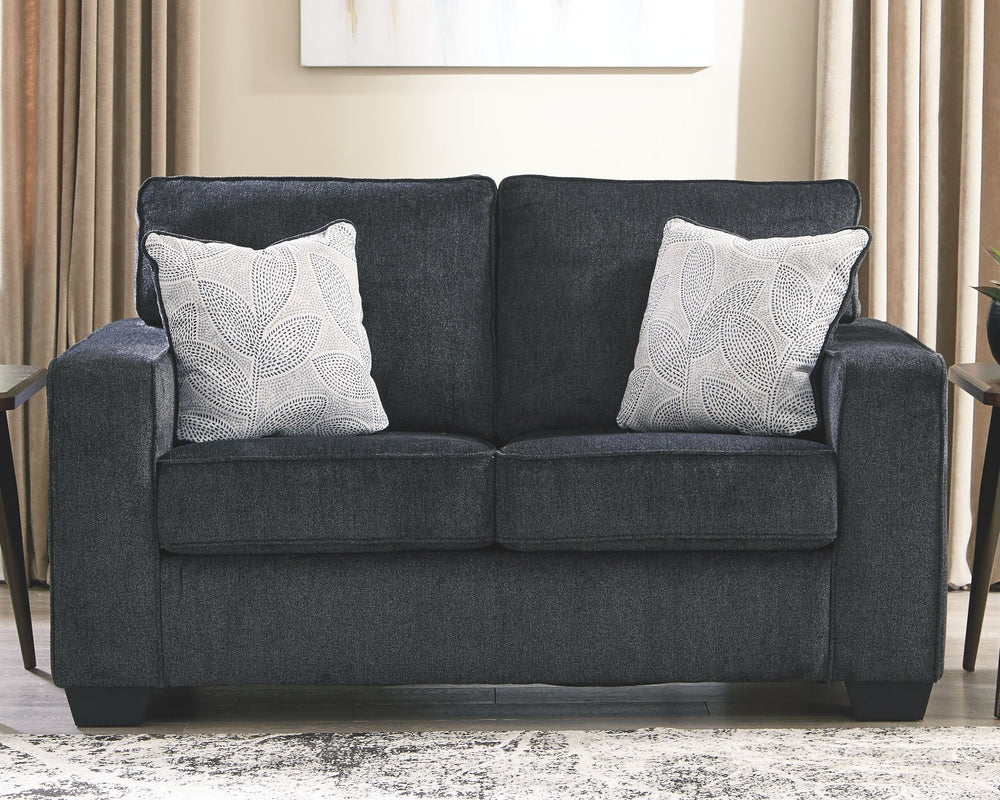 If style is the question, then this loveseat is the answer. Sporting clean lines and sleek track arms, the decidedly contemporary profile is enhanced with plump cushioning and a chenille-feel upholstery that-'s so pleasing to the touch. Sure to play well 