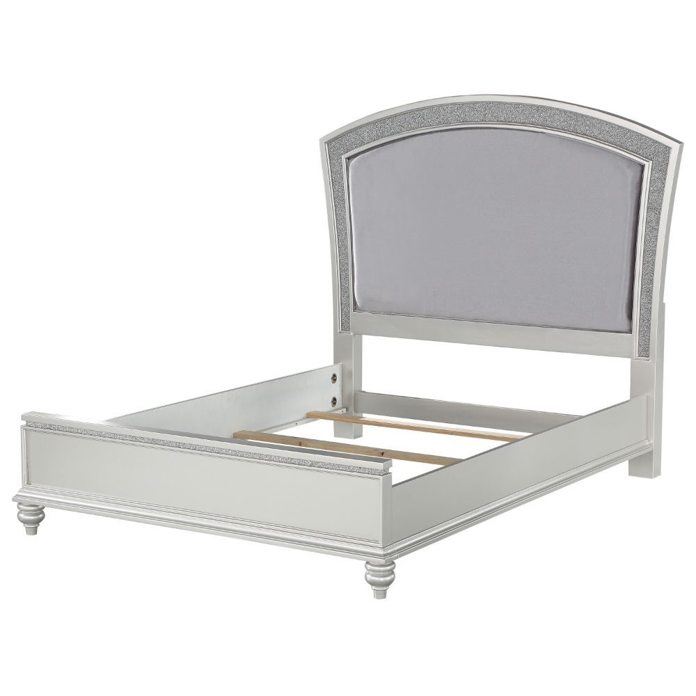 The Maverick bedroom collection provides a commanding presence in any bedroom. This contemporary panel bed features a fully padded headboard with low profile footboard, crafted with a transitional look that is an ideal addition to your bedroom. The headbo