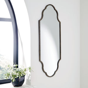  and this wall mirror is no exception. Its keyhole design with scalloped edges stands out in an antiqued goldtone metal frame