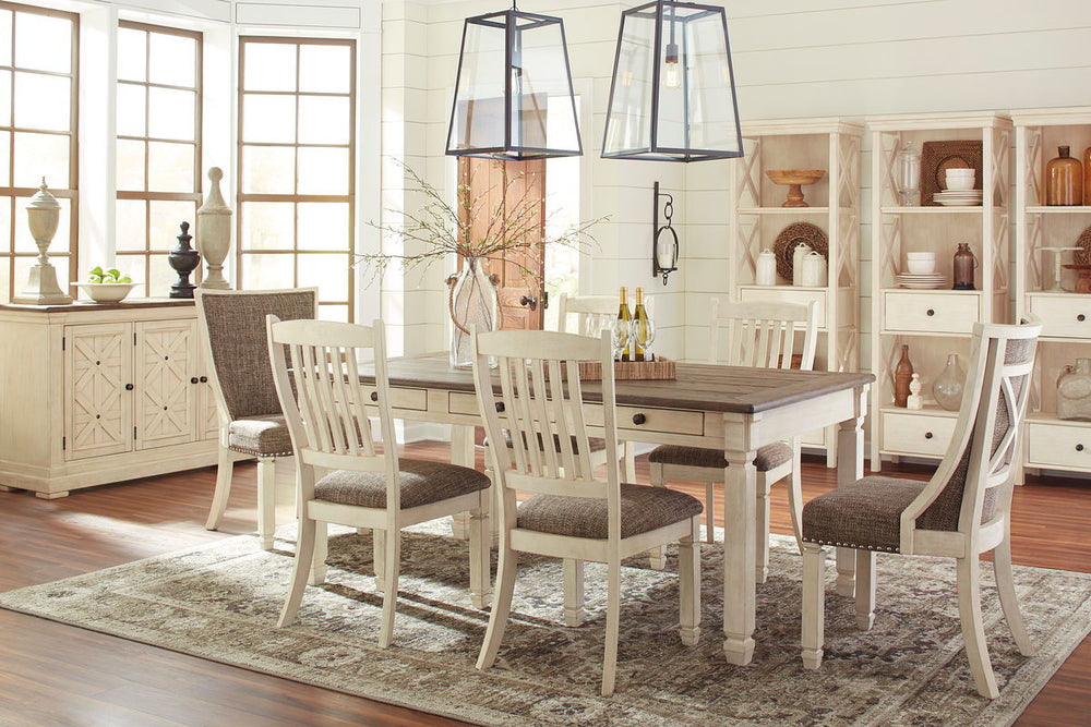 Unique two-tone finish with a combination of Oak and Acacia substrates combining a trendy textured antique white color with table and server tops finished in a textural weathered oak finish. Rectangular dining table features six convenient drawers for sto
