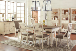 Unique two-tone finish with a combination of Oak and Acacia substrates combining a trendy textured antique white color with table and server tops finished in a textural weathered oak finish. Rectangular dining table features six convenient drawers for sto