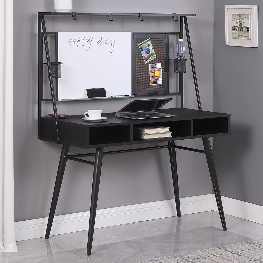 Slender mid-century-inspired metal tube legs angle outward, adding expression to the minimal, water and stain-resistant black finish of this modern writing desk. Complete with a black finished workspace and gunmetal finished accents, this writing desk len
