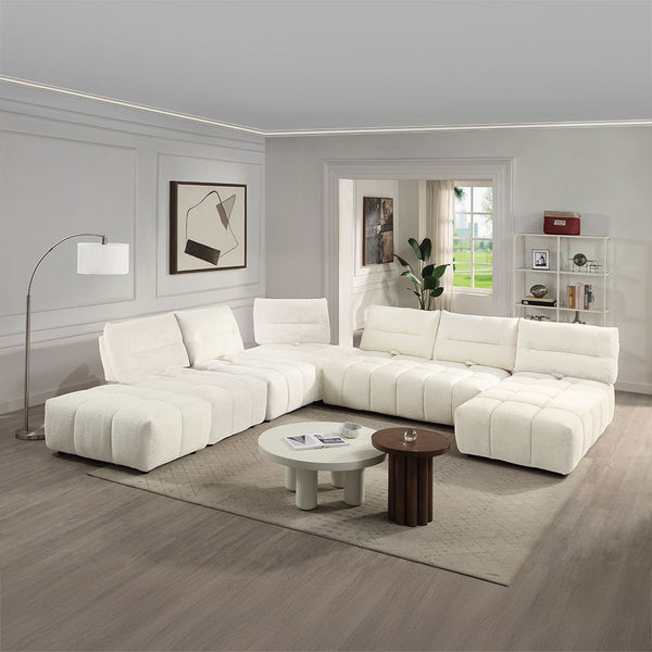 The Loanna collection modular sofa with its beige linen and coral red linen upholstery, offers versatile comfort and style. Its adaptable design allows for multiple configurations, making it perfect for any living space. The combination of neutral and vib