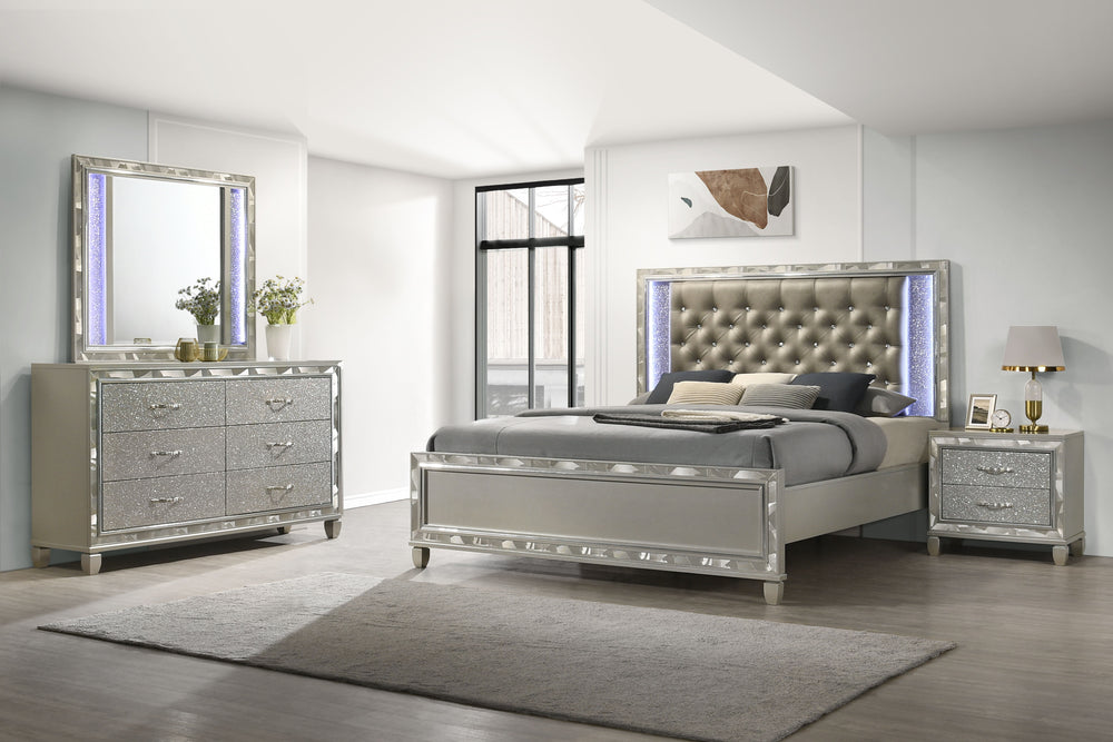 Discover the Radiance Queen 4 Piece Bedroom Set, comprising a Bed, Dresser, Mirror & Nightstand, meticulously crafted for enduring stability and durability from a combination of Solid Rubberwood and manufactured woods. Its semi-gloss lacquer Platinum Silv