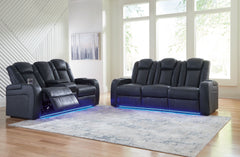 This power reclining set goes beyond basic comfort. It upgrades the everyday, turning your living room into an entertainment hub. Donâ€™t want to leave your seat? Keep essentials in reach with assorted charging options, cup holders and storage arms. You c