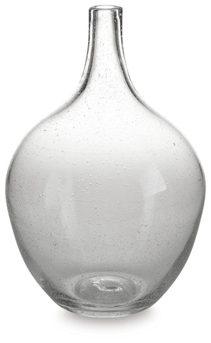 Infuse your shelf, mantel or tabletop with casual charm. Crafted from clear seeded glass, this vase effortlessly captures the essence of weathered beauty. Whether it-'s indoors or outdoors, this vessel is enchantingly simple unadorned or filled with your 