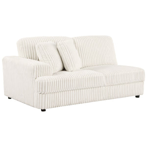Start your sectional with the LAF loveseat, upholstered in ivory wide corduroy for a plush, fur-like texture. This piece includes two pillows for added comfort and style, making it a perfect addition to your modular setup.