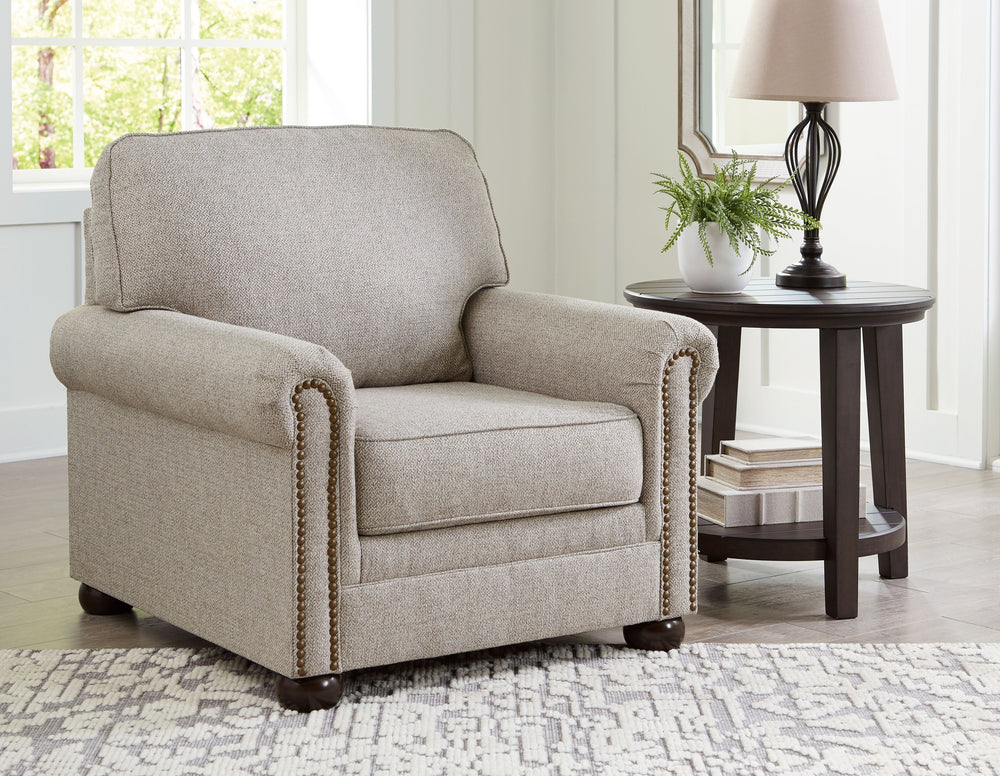 Inspired by the past but rooted firmly in the present, this living room set complements your transitional seating area. Its versatile upholstery is delightfully detailed for a subtle herringbone effect. Designer touches like decorative nailhead trim and b