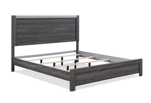  gray finish with a streamlined design. The sturdy bed acts as the focal point with a bold yet unadorned headboard