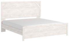 Cool, clean and casually modern. This king panel bedâ€™s wispy whitewash finish sets the tone for your calming sanctuary. Framed elements and cross-brace accents add dimension and authenticity to the bedâ€™s simply stunning profile. <h4><b>Gerridan - Whit