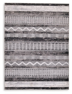 Drawing on tribal weaving motifs, this area rug features a repeating pattern with several unique markings. Its distressed design and neutral palette provide a distinctive look and feel for a variety of interiors, from contemporary to boho chic. Whether in
