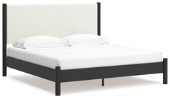 This king upholstered panel bed reflects your sophisticated approach to boho style. Crafted with both form and function in mind, its fresh white fabric beautifully contrasts the matte black finish. The versatile design suits all-neutral spaces or blends w