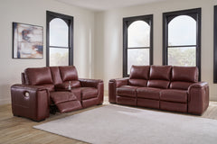Impressive in scale while keeping an air of refinement, this power reclining sofa and loveseat stuns with soft, supple leather match upholstery in garnet. Sink into real leather in the seating area and inside back while catering to your comfort with one-t