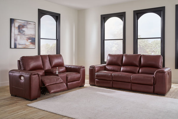 Impressive in scale while keeping an air of refinement, this power reclining sofa and loveseat stuns with soft, supple leather match upholstery in garnet. Sink into real leather in the seating area and inside back while catering to your comfort with one-t