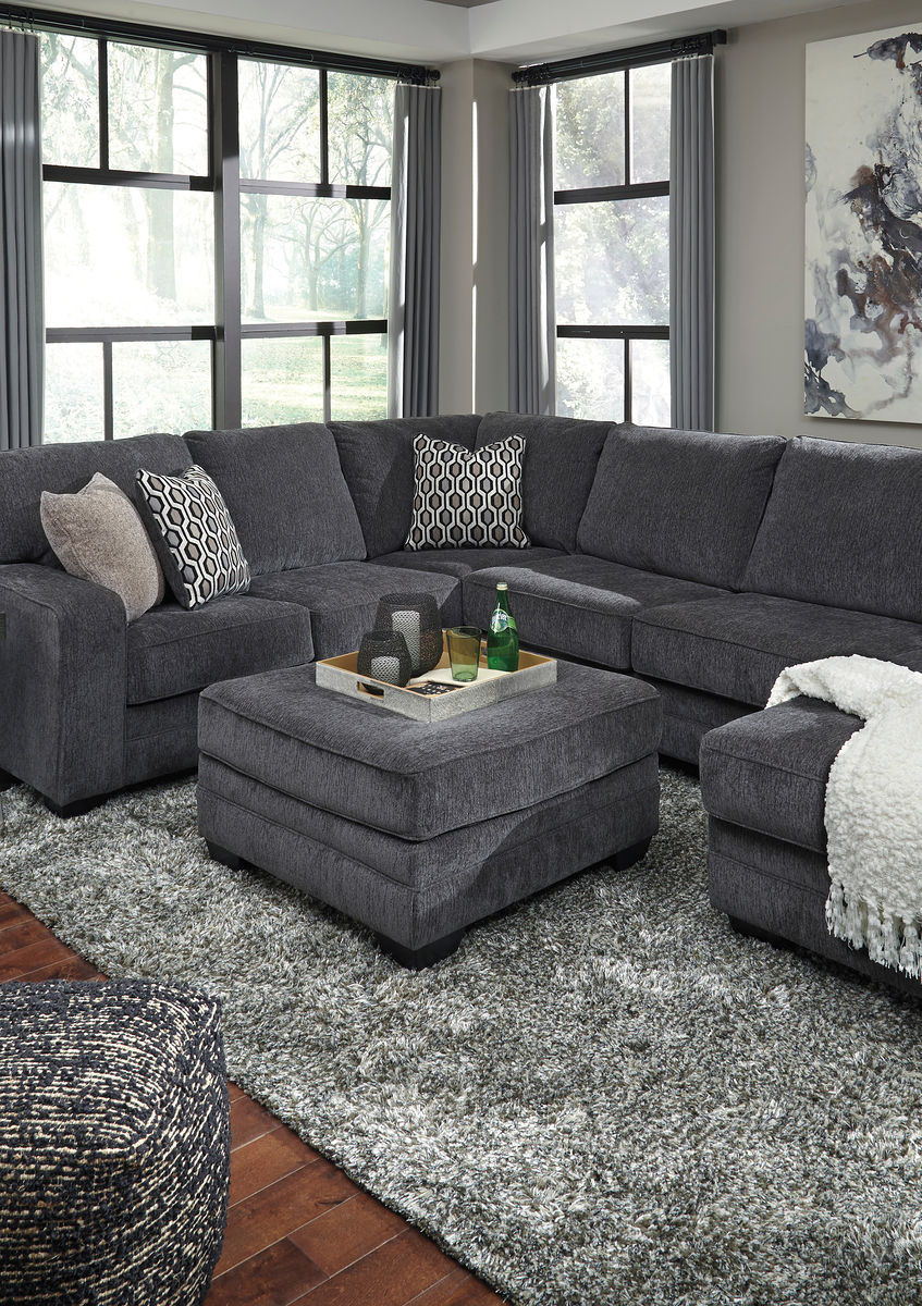 Talk about easy street. This effortlessly chic sectional set puts you at the intersection of cool and comfortable. Ultra-deep seats are custom made for afternoon naps and movie night marathons. So plush to the touch, the sectionalâ€™s slate gray upholster
