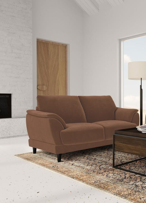  it combines plush foam seat cushions and curved tufted arms for a cozy and supportive feel. Built with a fully encased engineered wood frame and 