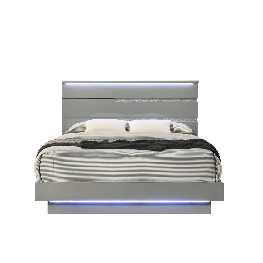 The Paradox Bed in Gray redefines contemporary elegance with its gleaming Gray gloss laminate finish that offers both a sleek look and practical benefits such as scratch and water resistance. This bed includes a headboard, footboard, side rails, and a bed