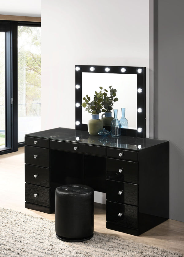 Step into a world of glamour with this sleek and chic vanity set, a perfect fusion of functionality and fashion. Its glossy black finish and clean lines are complemented by the sparkle of crystal-like knobs, adding a touch of sophistication to your person