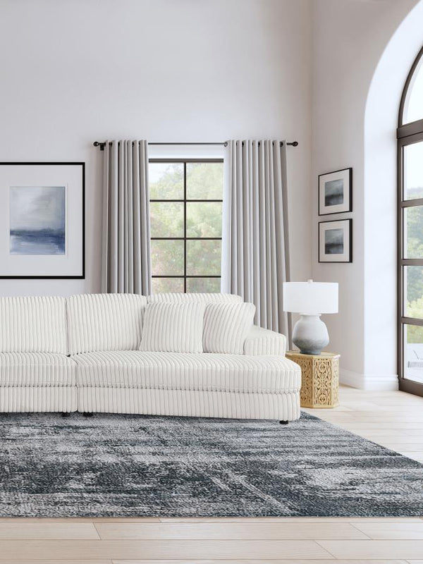  designed for cuddling and relaxation. Upholstered in ivory wide corduroy