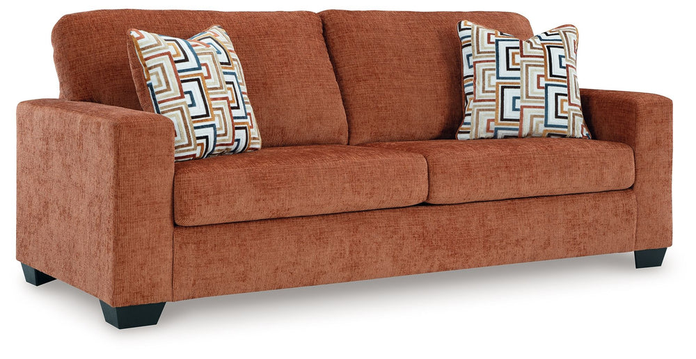 Looking to make a bold statement with color? Liven up your living room with this queen sofa sleeper. Its trend-right burnt orange upholstery adds a playful pop of color to your decor. Bold and eclectic accent pillows complete the look. Pairing posh style 