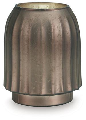 If contemporary style speaks to your design sensibilities, this vase will captivate you with its on-point aesthetics. Its stunning mercury glass finish and fluted design make it a visual delight. This exquisite piece effortlessly stands out on its own, or