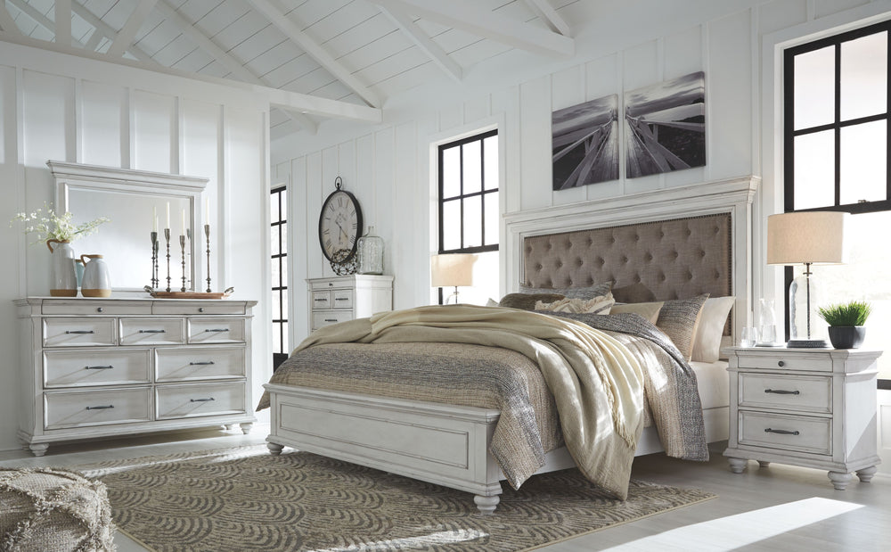 Made with veneers and select hardwood solids in a distressed whitewashed finish. Design features updated traditional styling with generously scaled moulding details. Dresser features 7 full sized drawers with 2 small scaled accessory drawers. Ball bearing