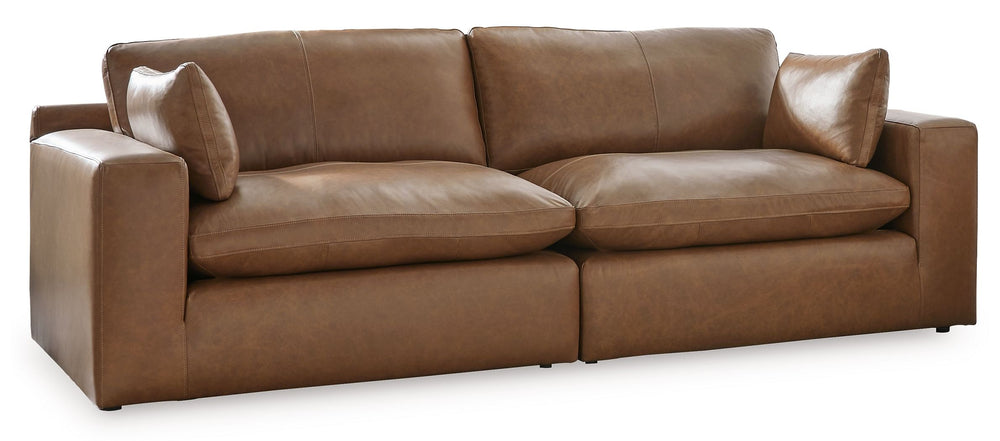 Catering to your contemporary lifestyle, this sectional loveseat and ottoman are a handsome marriage of masculine and feminine sensibilities. Feather-fiber cushions and bolster pillows soften the look of its chunky, linear silhouette. Warmly hued leather 
