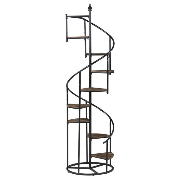 A unique black bookcase in a spiral design is sure to make your heart sing. Eight open shelves cascade down the frame of this rustic and industrial piece. The frame is crafted from metal with a black finish. The triangular shelves are finished in a warm w