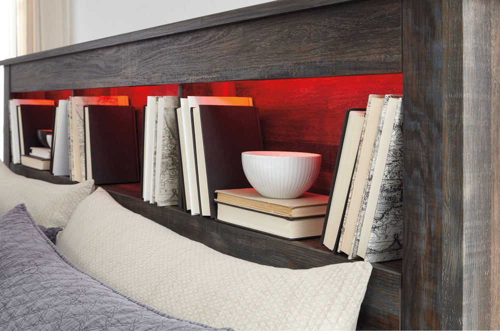 When merged in just the right way, rustic and industrial styles can make one happy marriage. Case in point: this queen bookcase bed with storage. A refined take on barn board beauty, its complex, replicated wood grain showcases hints of burnt orange and t