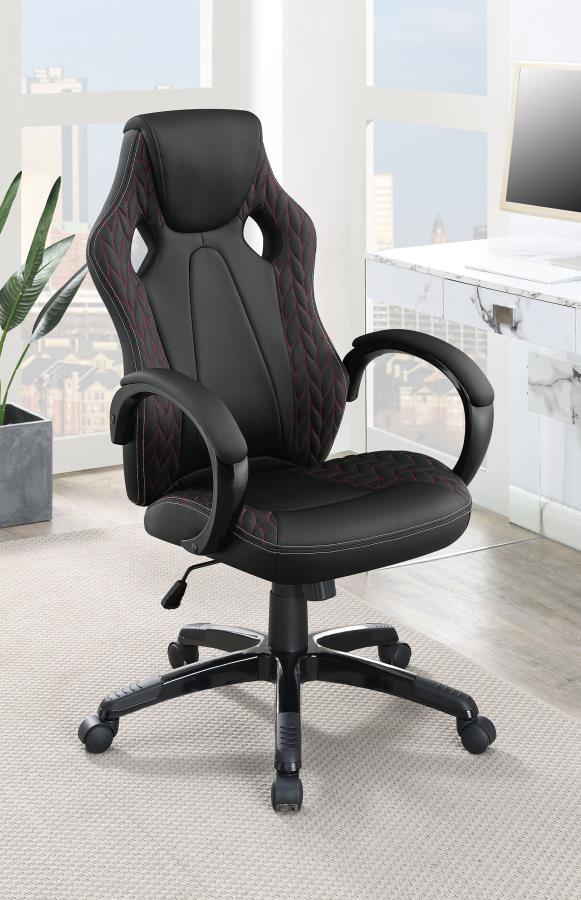  this contemporary office chair is wrapped in a black leatherette that offers a bold statement piece. Accenting the black leatherette is a botanical-inspired herringbone pattern with a red stitching details