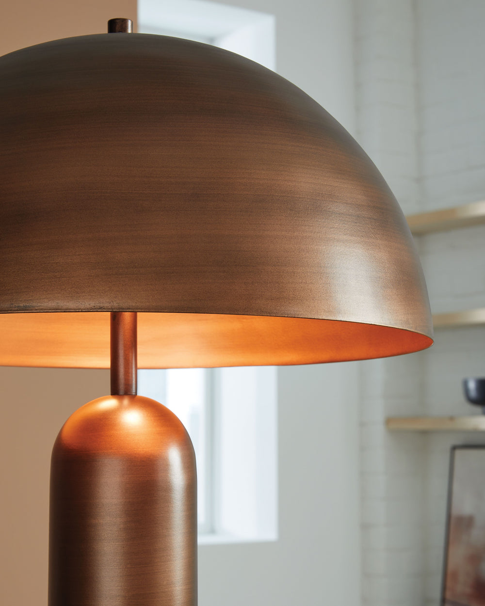 Dome sweet dome. Shine a light on your love of all things contemporary with this striking floor lamp. Its sleek antiqued copper-tone finish and bold, columnar design add a brilliantly modern touch to any room. A dome-shaped shade provides a warm and focus