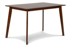 The Morocco Dining Table is a picture of Mid-Century Modern design with its tapered legs, slim profile top, and classic walnut brown color. Designed for smaller spaces, this table comfortably seats 4 people and works perfectly as a kitchen table, dining t