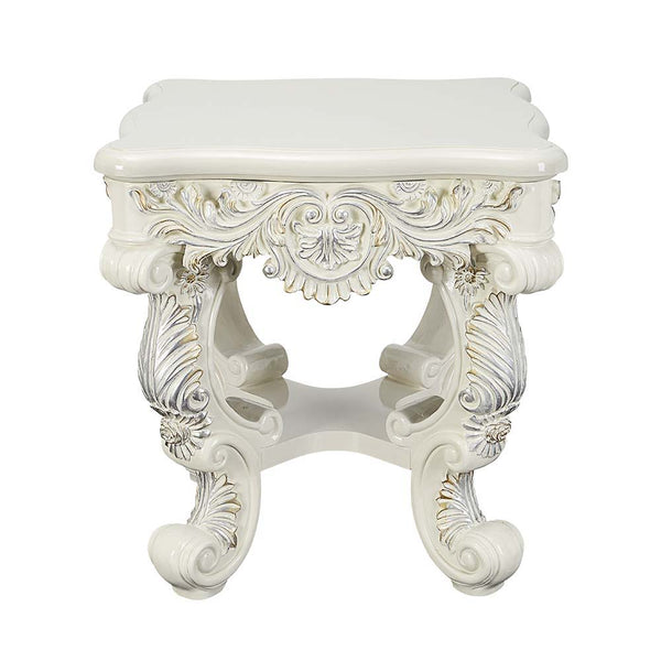  this console table features a round tabletop that is followed by intricate detailing around t
