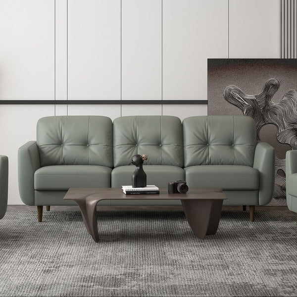 Combining the stunning visual effect of art with lines and comfort, the Radwan sofa set is one youâ€™ll want to spend lots of time in. This beautiful caramel or pesto green leather sofa features button tufted cushions with contrast tone stitching and uniq