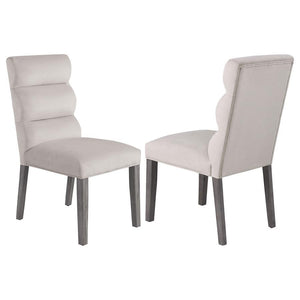 A pillowy look and feel brings ultimate comfort to a casual living space, targeting your kitchen or dining room with a light, floaty vibe, and adding a festive feel. This set of two side chairs checks all the boxes of design, comfort, and easy-living eleg